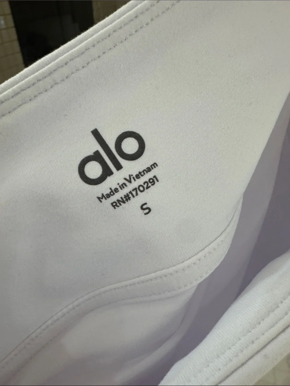 ALO Yoga logo hem clean
